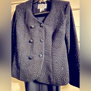 This two piece navy blue pants set, was only worn once.